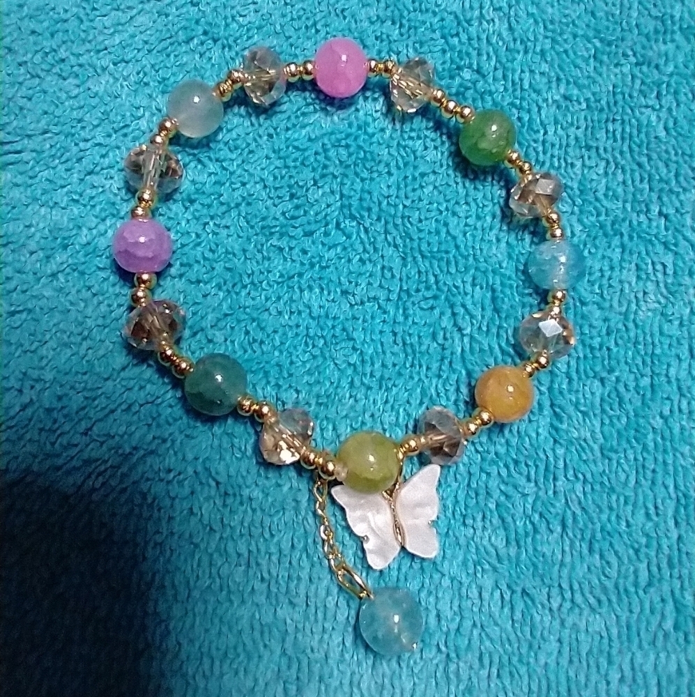 Goldtone multicolor white butterfly beaded stretch bracelet
